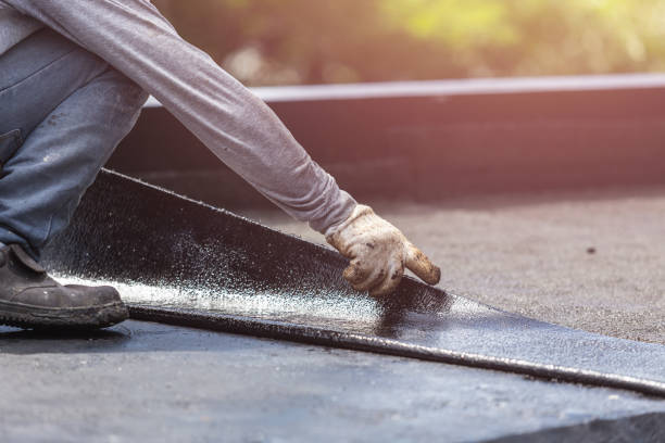 Professional Waterproofing technician working in Lake Mills, WI